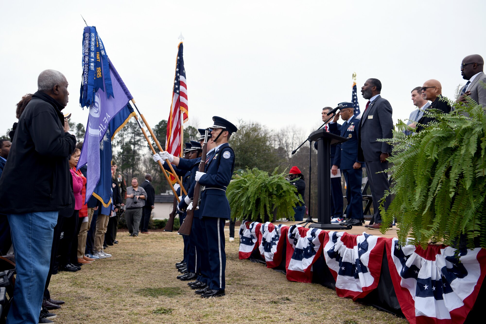 John F. Kennedy, 20th Force Support Squadron Military and Family Readiness Center chief, performs the national anthem during a Tuskegee Airmen Monument dedication ceremony at Veterans Park in Sumter, S.C., Feb. 9, 2024. Cadets from Crestwood High School Air Force Junior Reserve Officers’ Training Corps presented the colors during the ceremony. (U.S. Air Force photo by Staff Sgt. Kelsey Owen)