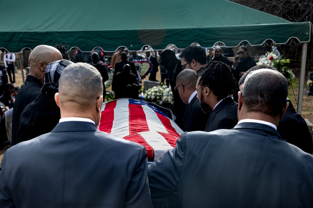 Members of the Chaney family carry U.S. Marine Corps Pfc. John Henry Chaney to his final resting place at John Wesley United Methodist Church Cemetery in Clarksburg, Maryland, Feb. 8, 2024. Chaney was drafted in the Marine Corps in 1943, becoming one of the legendary Montford Point Marines, the first Black Americans to earn the title. Chaney served in World War II and fought at the harrowing Battle of Iwo Jima. In 2012, Chaney and other Montford Point Marines, were presented the Congressional Gold Medal. (U.S. Marine Corps photo by Staff Sgt. Kelsey Dornfeld)