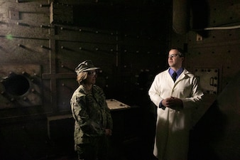 INDIAN HEAD, Md. (Feb. 9, 2024) - Dr. Philip Cole, an engineer at Naval Surface Warfare Center Indian Head Division (NSWC IHD), briefs Chief of Naval Operations Adm. Lisa Franchetti during a tour of NSWC IHD in Indian Head, Md., Feb. 9. Franchetti was able to see first-hand the high-end technological advancements in Navy munitions that Sailors and civilians are making at NSWC IHD. (U.S. Navy photo by Mass Communication Specialist 1st Class William Spears)