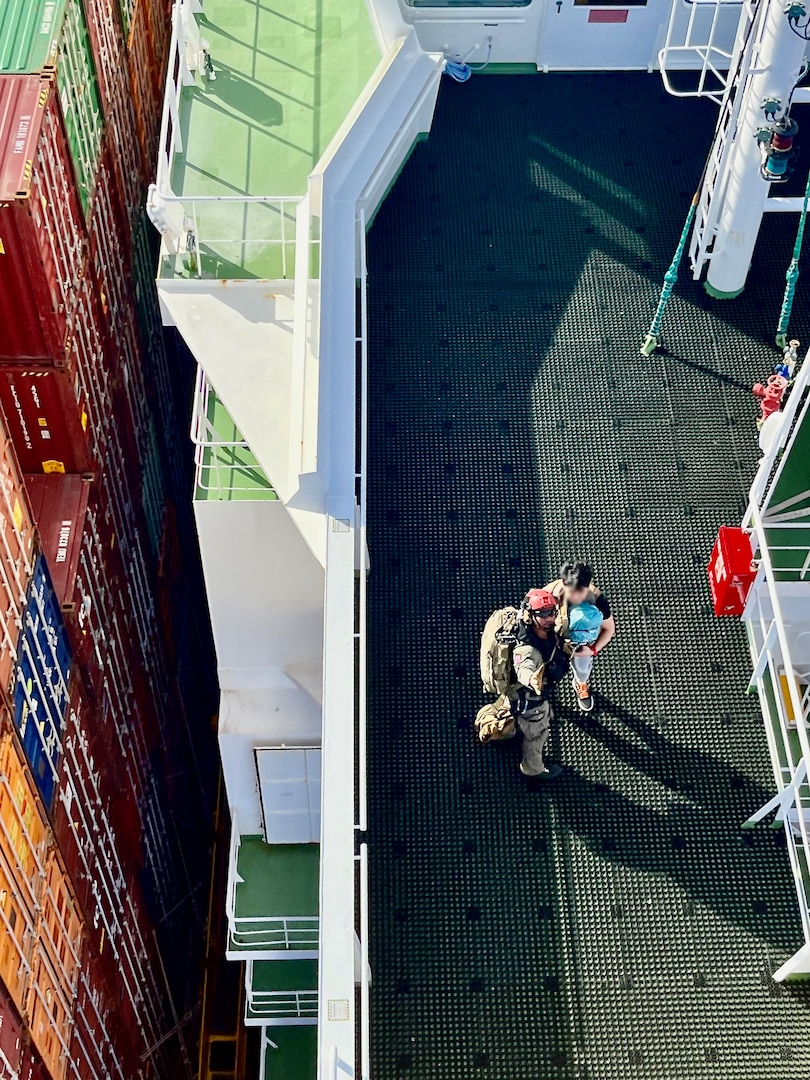 The crew of a U.S. Navy's Helicopter Sea Combat Squadron 25 MH-60S Knighthawk helicopter crew airlift a commercial mariner from the motor vessel Antwerpen Express 50 nautical miles off of Saipan in 7-foot seas and winds of 16 mph on Feb. 9, 2024. He was delivered to the capable hands of emergency medical responders from Guam Fire Rescue at Naval Hospital Guam. They further transported him to Guam Memorial Hospital in stable condition. (U.S. Navy photo)