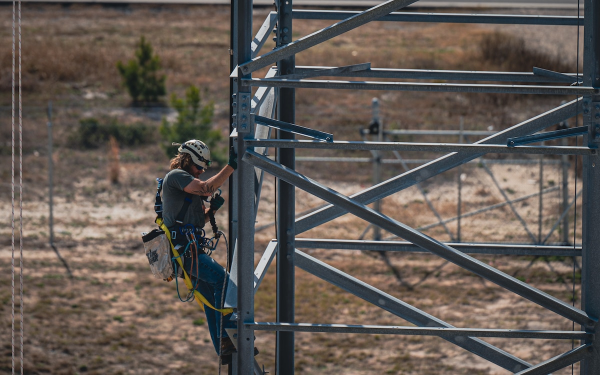 Civilian installs radio equipment