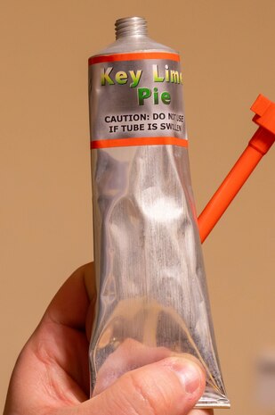 Key lime pie “tube food” is inspected by a local community member.