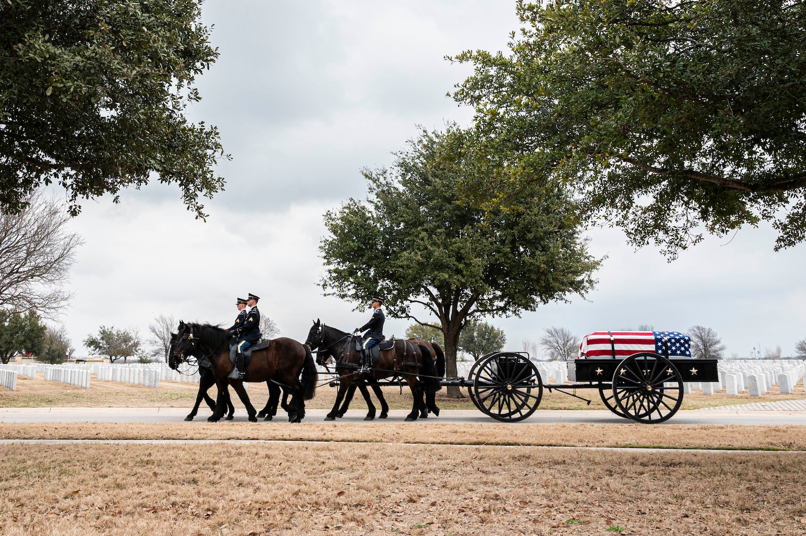 Soldiers with the Fort Sam Houston Caisson Section carry the flag-draped casket of fifth Chief Master Sgt. of the Air Force Robert D. Gaylor during his interment ceremony, Feb. 10, 2024 at Fort Sam Houston National Cemetery, Texas. Gaylor spent more than seven decades improving the Air Force through its people. He was an active proponent of professional military education and delivered seminars frequently in-person and online until his passing. (U.S. Air Force photo by Tristin English).