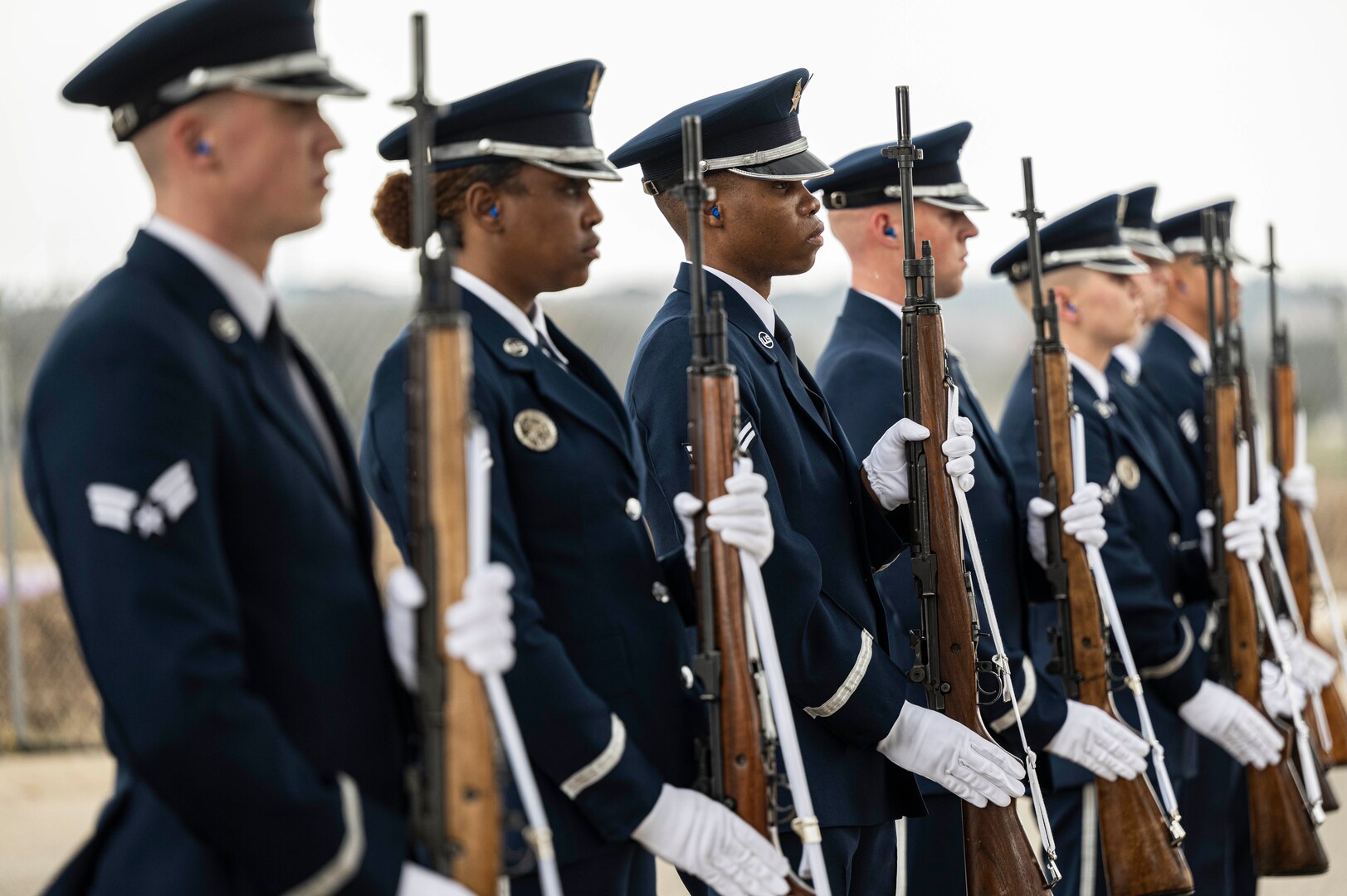 The U.S. Air Force Honor Guard firing party members perform a salute during the interment of fifth Chief Master Sgt. of the Air Force Robert D. Gaylor, Feb. 10, 2024 at Fort Sam Houston National Cemetery, Texas. Gaylor left his home in Indiana to enlist in the Air Force and then called San Antonio his post-military home for more than four decades. He is survived by his son, Kenny, and daughters Carol and Elaine. (U.S. Air Force photo by Tristin English).