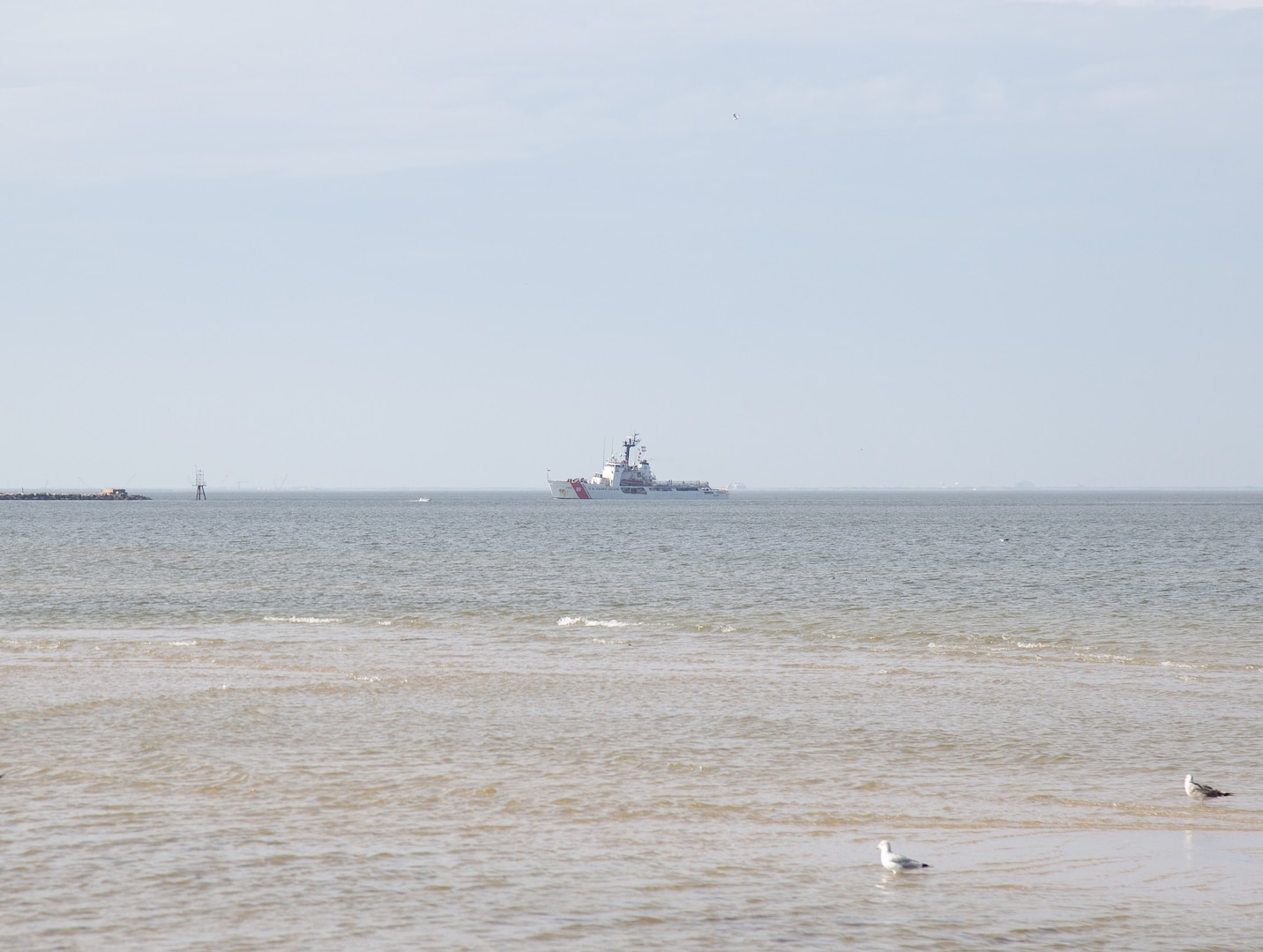 U.S. Coast Guard Cutter Dependable (WMEC 626) and crew transit toward the pier, Feb. 10, 2024, in Virginia Beach, Virginia. Dependable returned home following a two-month maritime safety and security patrol in the Florida Straits and Windward Passage. (U.S. Coast Guard photo by Kayla Gill)
