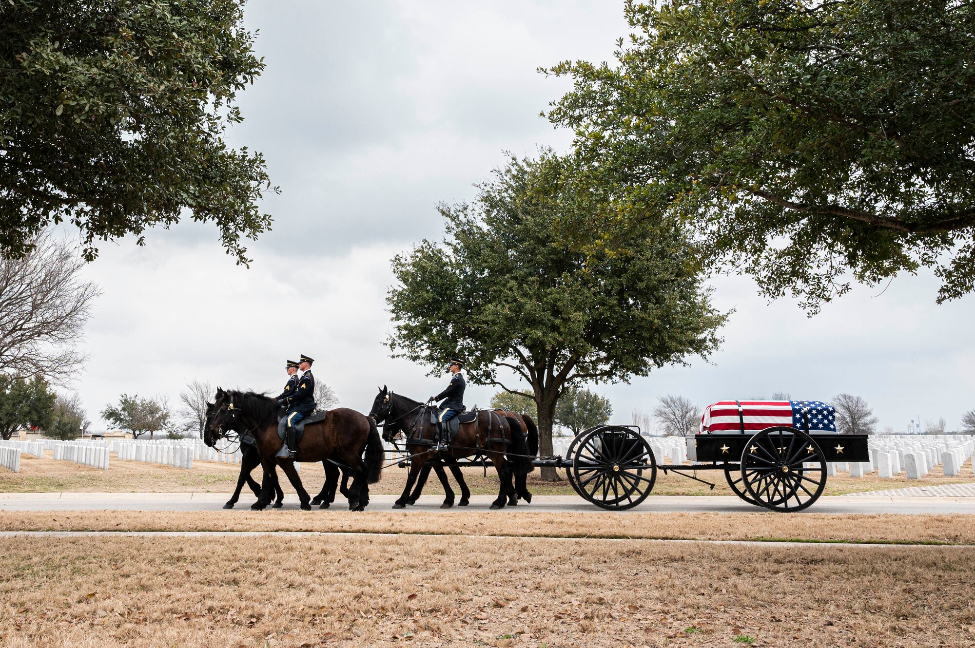 Soldiers with the Fort Sam Houston Caisson Section carry the flag-draped casket of fifth Chief Master Sgt. of the Air Force Robert D. Gaylor during his interment ceremony, Feb. 10, 2024 at Fort Sam Houston National Cemetery, Texas. Gaylor spent more than seven decades improving the Air Force through its people. He was an active proponent of professional military education and delivered seminars frequently in-person and online until his passing. (U.S. Air Force photo by Tristin English).