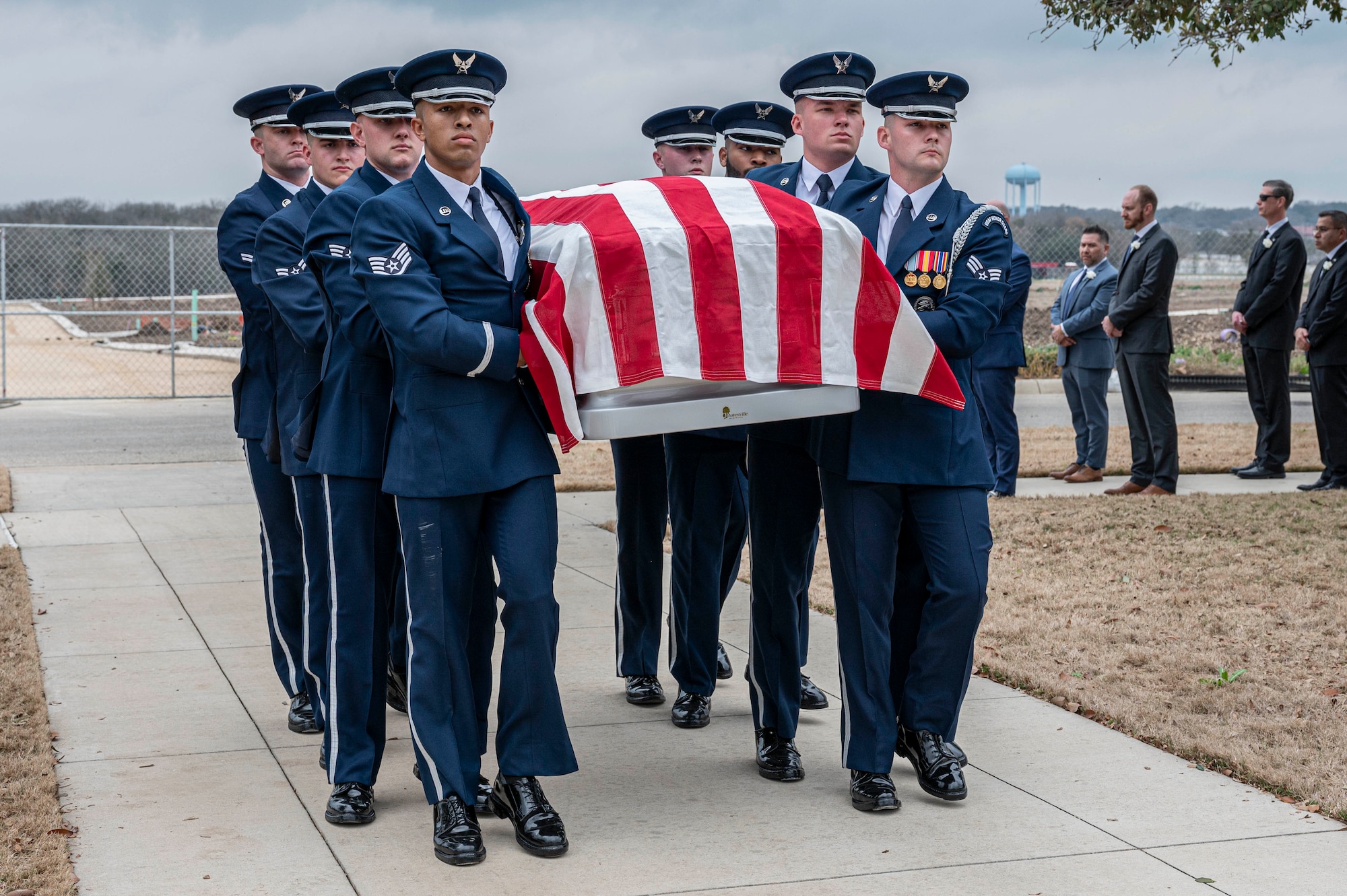 Soldiers with the Fort Sam Houston Caisson Section carry the flag-draped casket of the fifth Chief Master Sgt. of the Air Force Robert D. Gaylor during his interment with full military honors ceremony, Feb. 10, 2024 at Fort Sam Houston National Cemetery, Texas. Gaylor spent more than seven decades improving the Air Force through its people. He was an active proponent of professional military education and delivered seminars frequently in-person and online until his passing. (U.S. Air Force photo by Tristin English).