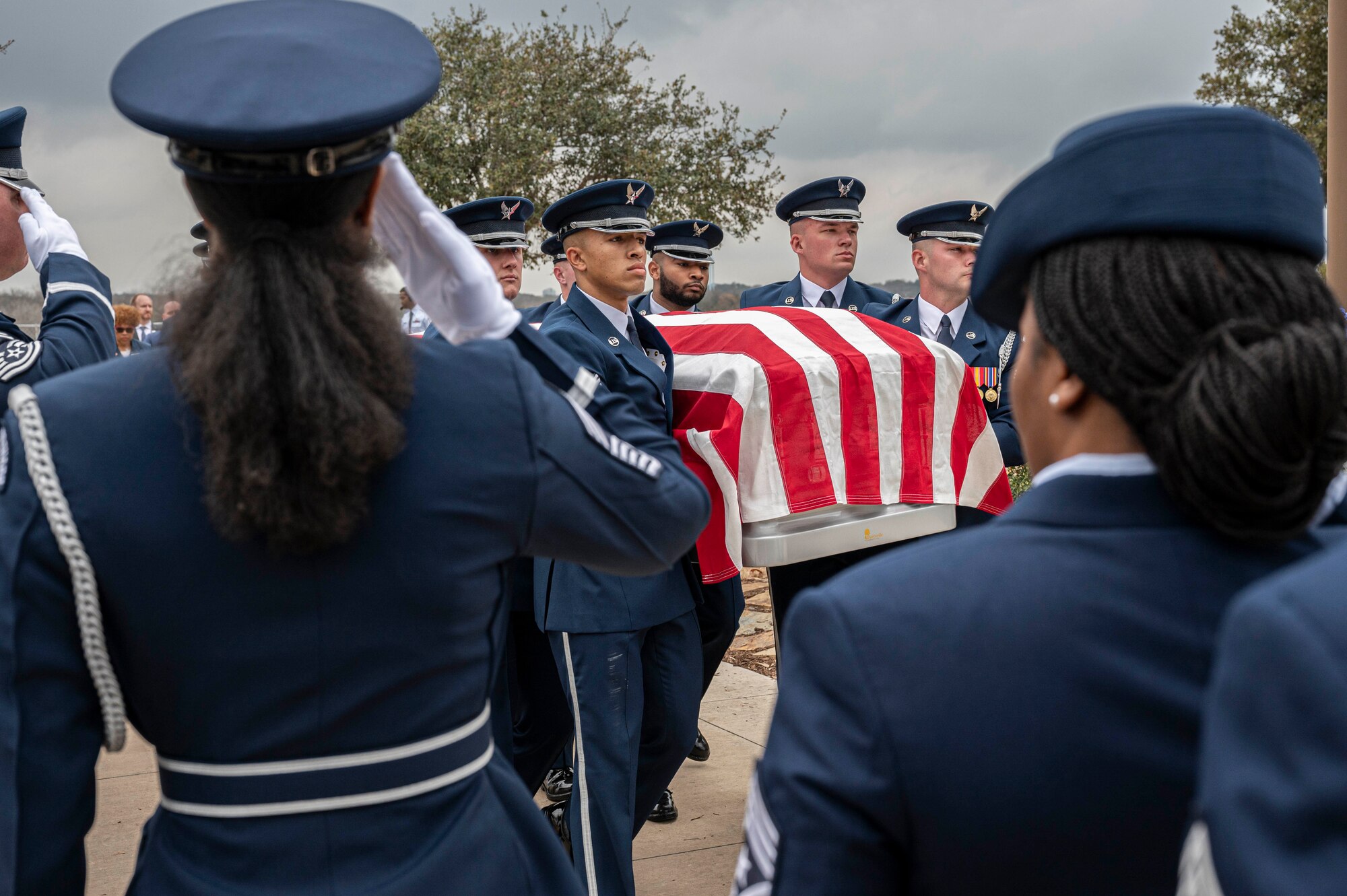 Soldiers with the Fort Sam Houston Caisson Section carry the flag-draped casket of fifth Chief Master Sgt. of the Air Force Robert D. Gaylor during his interment ceremony, Feb. 10, 2024 at Fort Sam Houston National Cemetery, Texas. Gaylor spent more than seven decades improving the Air Force through its people. He was an active proponent of professional military education and delivered seminars frequently in-person and online until his passing. (U.S. Air Force photo by Tristin English).