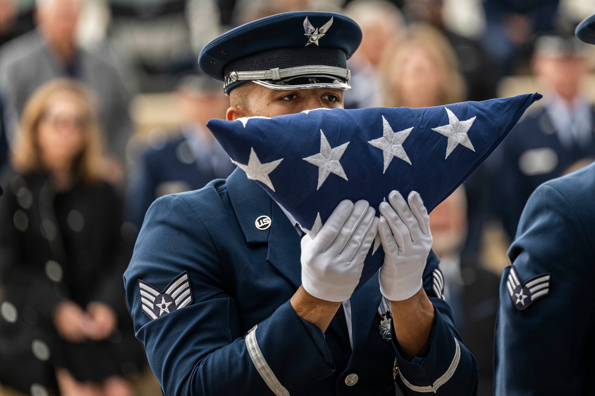 Members of the U.S. Air Force Honor Guard fold the U.S. flag during the interment with full military honors of the fifth Chief Master Sgt. of the Air Force Robert D. Gaylor, Feb. 10, 2024 at Fort Sam Houston National Cemetery, Texas. Gaylor championed Air Force professional military education in the 1960s and 1970s before he was promoted to Chief Master Sgt. of the Air Force in 1977. He continued to educate and inspire service members for more than 40 years after his retirement from military service. (U.S. Air Force photo by Tristin English).