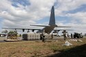 U.S. Marines with Marine Aerial Refueler Transport Squadron 152, 1st Marine Aircraft Wing, unload equipment from a KC-130J Super Hercules aircraft in preparation to transport Department of Social Welfare and Development family food packs at Villamor Airbase, Philippines, Feb. 11, 2024. At the request of the Government of the Philippines, the U.S. Marines of III Marine Expeditionary Force are supporting the U.S. Agency for International Development in providing foreign humanitarian assistance to the ongoing disaster relief mission in Mindanao. The forward presence and ready posture of III MEF assets in the region facilitated rapid and effective response to crisis, demonstrating the U.S.’s commitment to Allies and partners during times of need. (U.S. Marine Corps photo by Sgt. Savannah Mesimer)