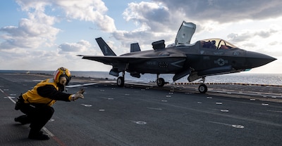 Flight operations aboard USS America (LHA 6) in the Pacific Ocean.