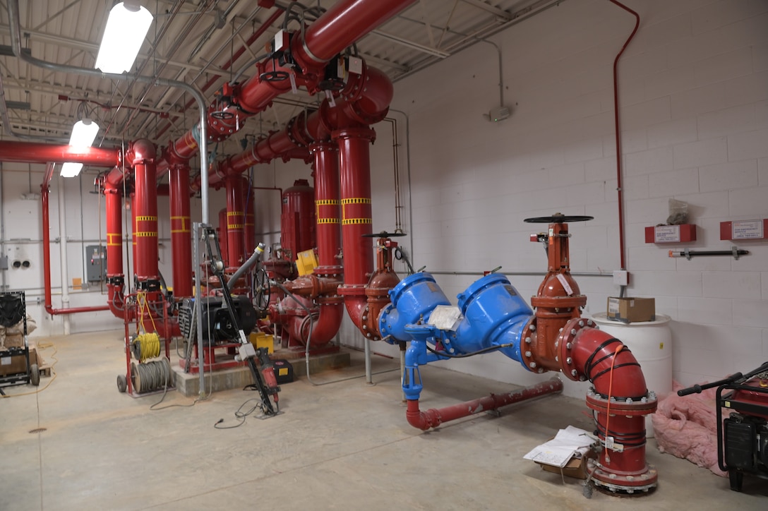 The water deluge fire protection system installed in an aircraft hangar of the Wisconsin Air National Guard's 115th Fighter Wing as seen on Apr. 13, 2023 at Truax Field in Madison, Wisconsin. In March 2023, the 115th Fighter Wing became the first U.S. Air Force base worldwide to terminate all use of foam-based fire suppression systems in its facilities. (U.S. Air National Guard photo by Isabella Jansen)