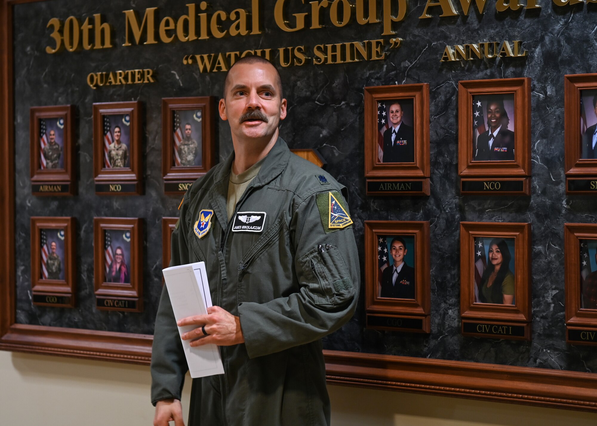 A 30th Medical Group Aerospace Medicine chief, discusses his role at the 30th MDG with Vandenberg area healthcare leaders during a Medical Leadership Summit tour of the medical facility at Vandenberg Space Force Base.