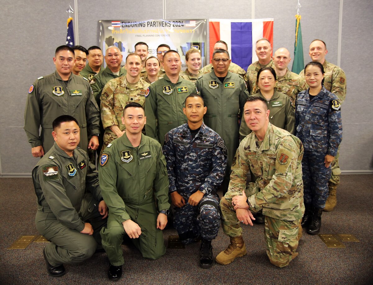 U.S. Airmen with the Washington Air National Guard and Royal Thai Air Force group photo kicks off the final planning conference for Enduring Partners 2024 at Camp Murray.