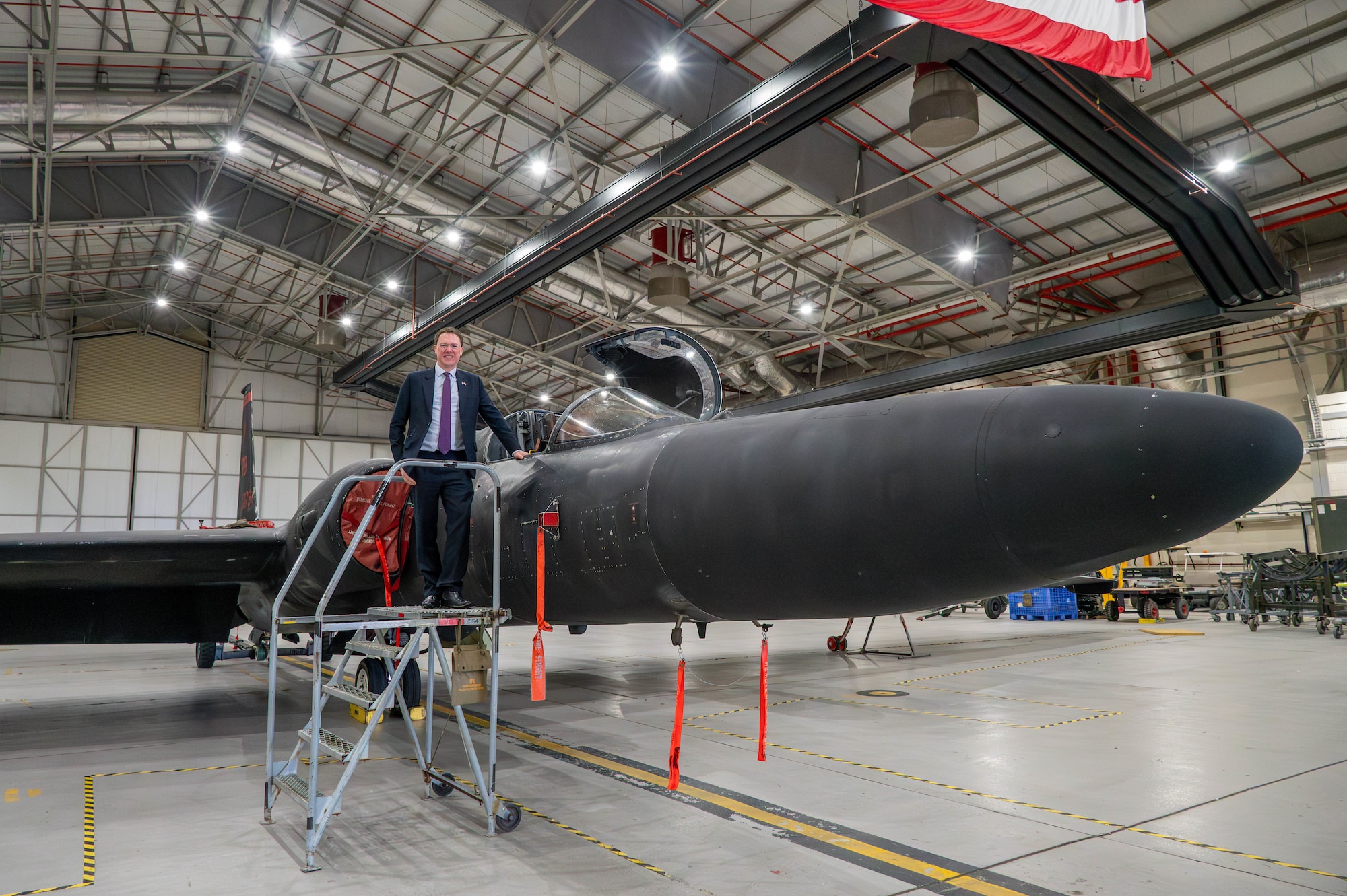 Robert Courts poses for a photo with a U-2 Dragon Lady