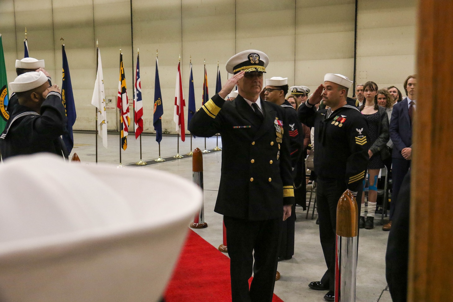 240202-N-IJ992-1109 OAK HARBOR, Wash. (Feb. 02, 2024) Rear Adm. Doug Verissimo, Commander Naval Air Forces, is welcomed aboard during the change of command ceremony of Electronic Attack Wing, U.S. Pacific Fleet, aboard Naval Air Station Whidbey Island (NASWI). Capt. David A. Ganci relieved Capt. David F. Harris as the commanding officer. (U.S. Navy photo by Mass Communication Specialist 2nd Class Andy Anderson)