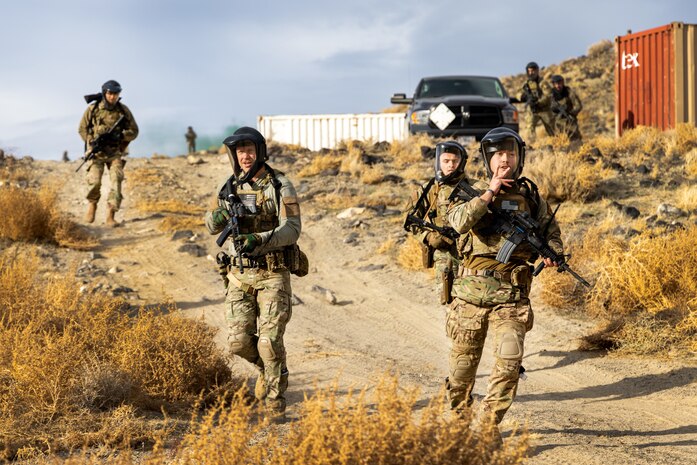 U.S. Air Force Airmen from the 9th Security Forces Squadron (SFS) and 9th Operations Support Squadron, Beale Air Force Base, California, infiltrate a forward operating site at Fallon, Nevada, Jan. 31, 2024.