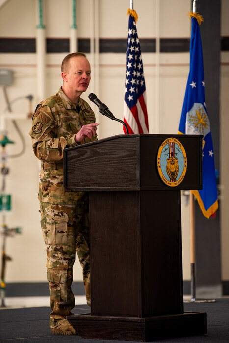 Brig. Gen. Derek Salmi, 60th Air Mobility Wing commander, speaks during the 2024 State of the Base ceremony