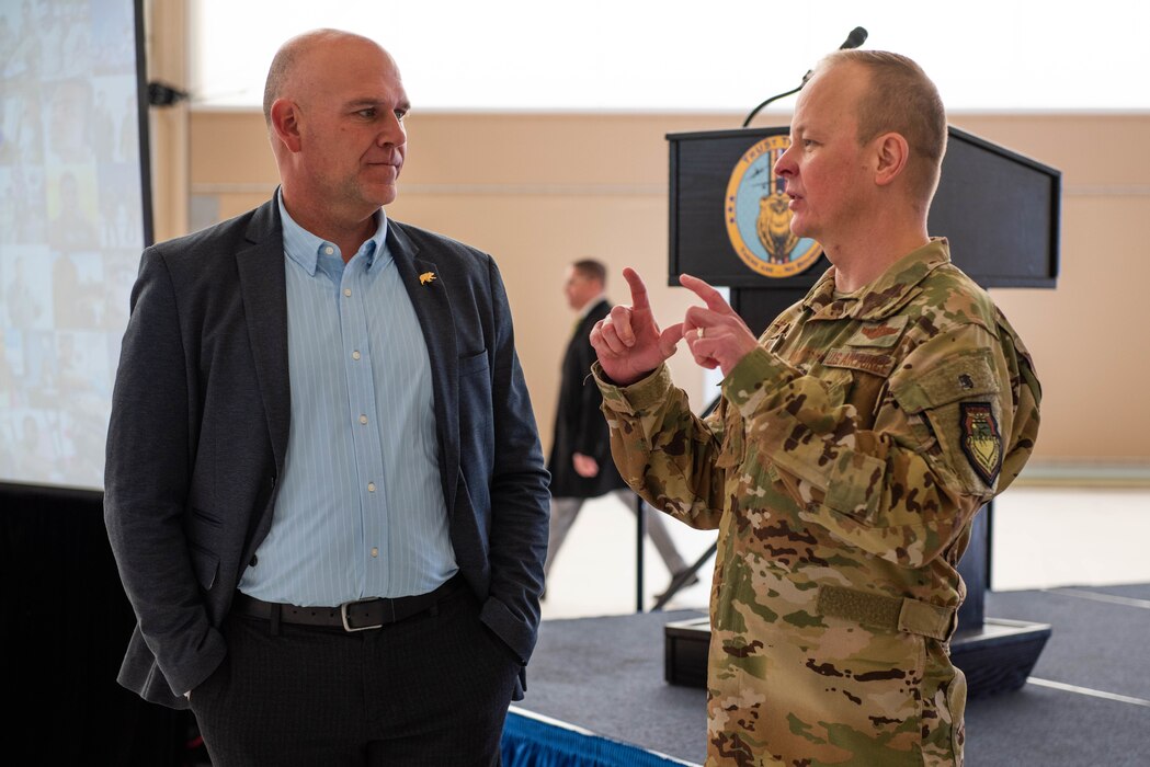 U.S. Air Force Brig. Gen. Derek Salmi speaks with State of the Base attendees.