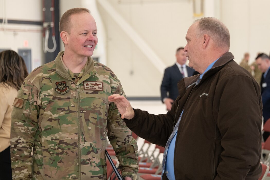 Brig. Gen. Derek Salmi greets State of the Base Attendees