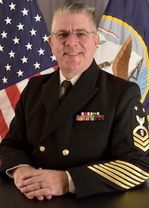 Master Chief Musician Greg Bonistalli, the senior enlisted leader assigned to U.S. Fleet Forces Band (USFFB), poses for a photograph onboard Naval Station Norfolk.