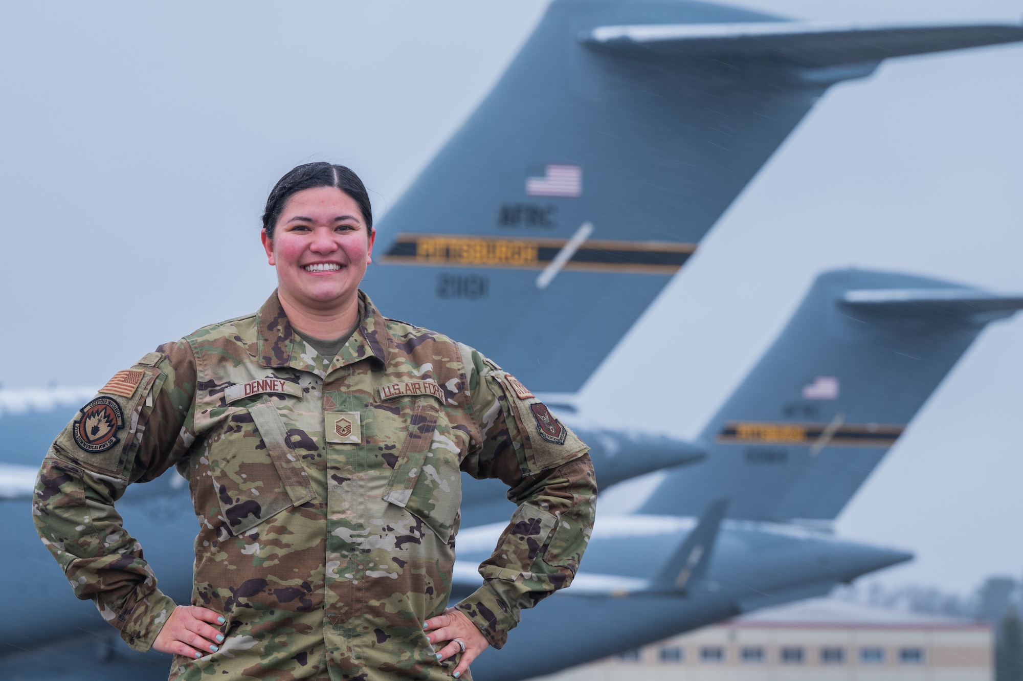 Master Sgt. Mariah Denney, 911th Communication Squadron noncommissioned officer in charge of Cyber Defensive Operations poses for a photo at Pittsburgh International Airport Air Reserve Station, Pennsylvania, Jan. 7, 2024. While Denney is in charge of cyber defensive operations during drill weekends she is also the branch chief for defensive cyber operations and the Department of Defense Information Network operations atFort George G. Meade, Maryland. (U.S. Air Force photo by Staff Sgt. Brandon M. Shuman)