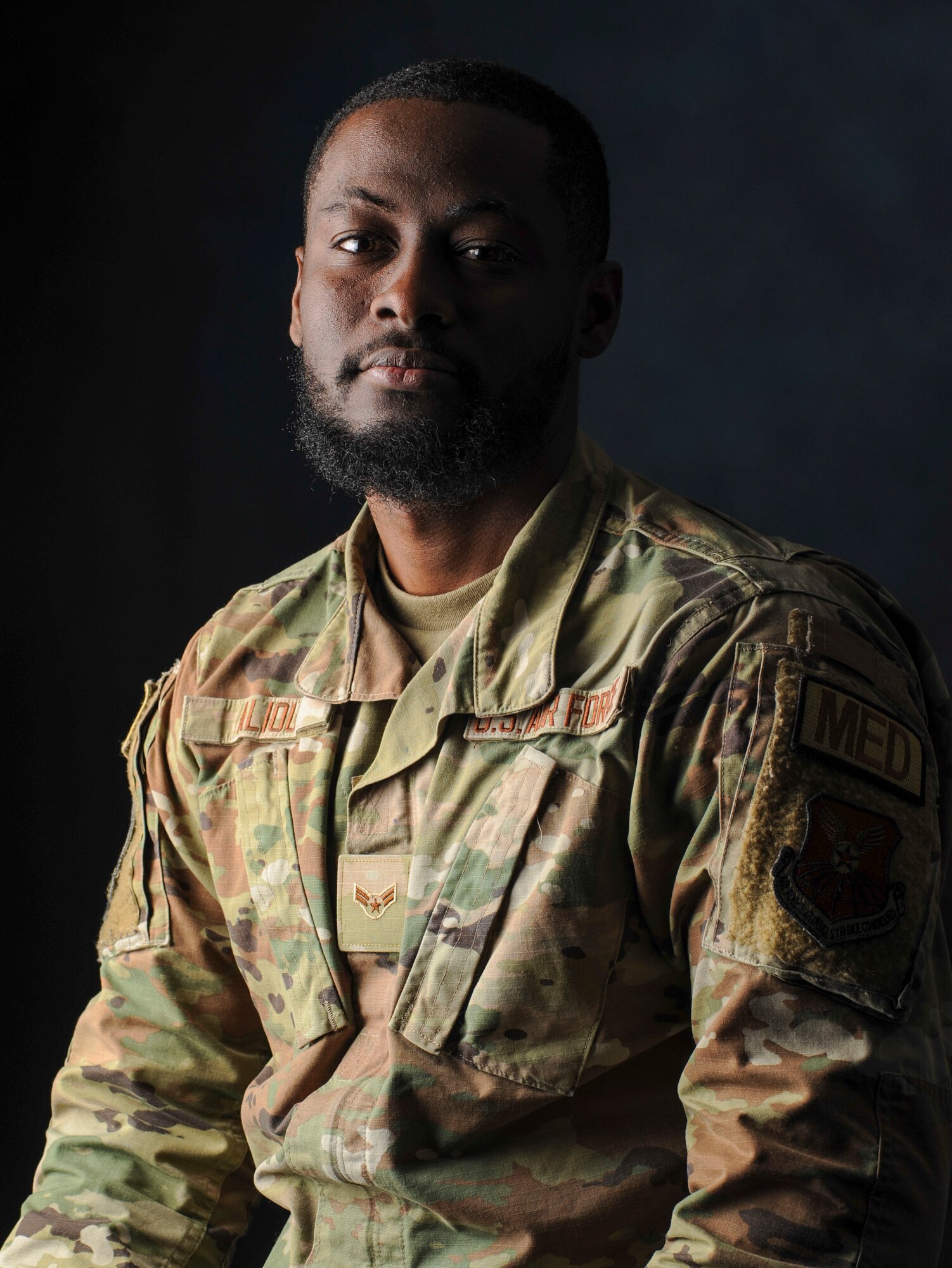 An Airman poses for a photo