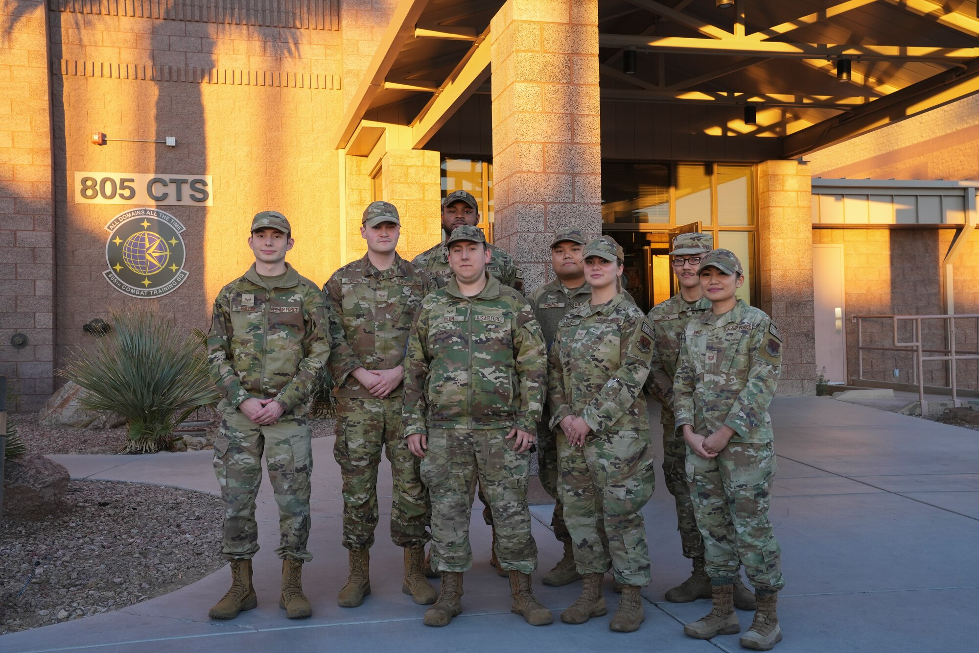 A group of Airmen stand for a group photo.