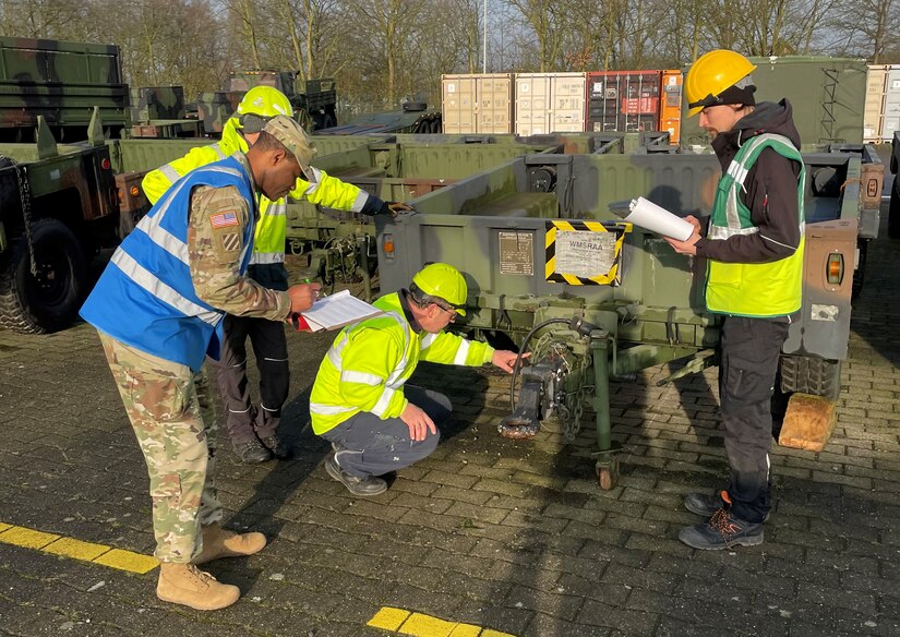 Army Sgt. 1st Class Belloc Anim, the commander’s responsible officer accountable for over $2.5 billion worth of Army Prepositioned Stocks-2 at the Dülmen APS-2 worksite, and his team check the serial number on a trailer during a 100 percent inventory at the site, Feb. 13. The 47-year-old Soldier who was born and raised in Ghana but moved to the U.S. at age 28 said the assignment at Dülmen is like no other in the Army. (U.S. Army courtesy photo)