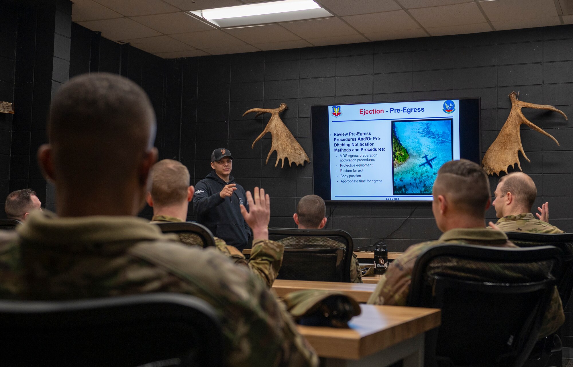 U.S. Air Force Staff Sgt. Michael Ferraro, 347th Operations Support Squadron Survival, Evasion, Resistance and Escape specialist, teaches a water survival class at Moody Air Force Base, Georgia, Feb. 8, 2024. Water survival training is essential in case of in-flight emergency. (U.S. Air Force photo by Airman 1st Class Leonid Soubbotine)