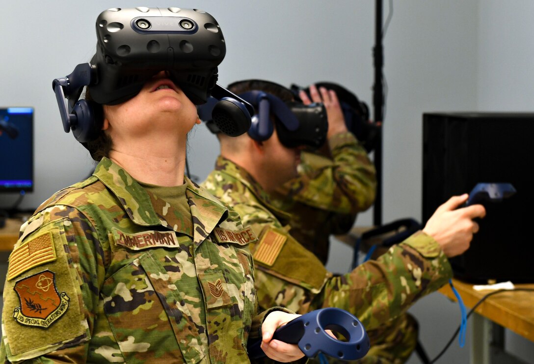 A 193rd Special Operation Wing airman uses virtual reality (VR) maintenance MC-130J Commando II training system in Middletown, Pennsylvania, Feb. 7 2024. VR is expected to provide more efficient and timely maintenance training, resulting in cost savings and increased aircraft availability. (U.S. Air National Guard photo by Staff Sgt. Bela John Vaszlavik)