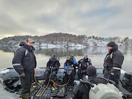 Sailors from Explosive Ordnance Disposal Mobile Unit (EODMU) Eight conduct mine counter measure diving operations with clearance divers from Norway and Denmark during exercise Arctic Specialist 24, Feb. 6, 2024. Exercise Arctic Specialist 2024 is an annual Norway-hosted multinational explosive ordnance disposal and mine countermeasures exercise focused on enhancing combined expeditionary command and control capabilities in the high-latitude and austere environments offered by Norway and its territorial waters. (U.S. Navy courtesy photo provided by Explosive Ordnance Disposal Mobile Unit Eight)