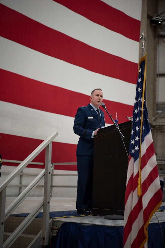 Brig. Gen. David May, Adjutant General for Air, Wisconsin National Guard, addresses all in attendance at the change of command ceremony, here at Milwaukee Mitchell Airfield, Feb. 3, 2024. The passing of colors from an outgoing commander to an incoming one ensures the unit and its Airmen are never without official leadership, a continuation of trust. (U.S. Air National Guard photo by Airman 1st Class Cynthia Yang)