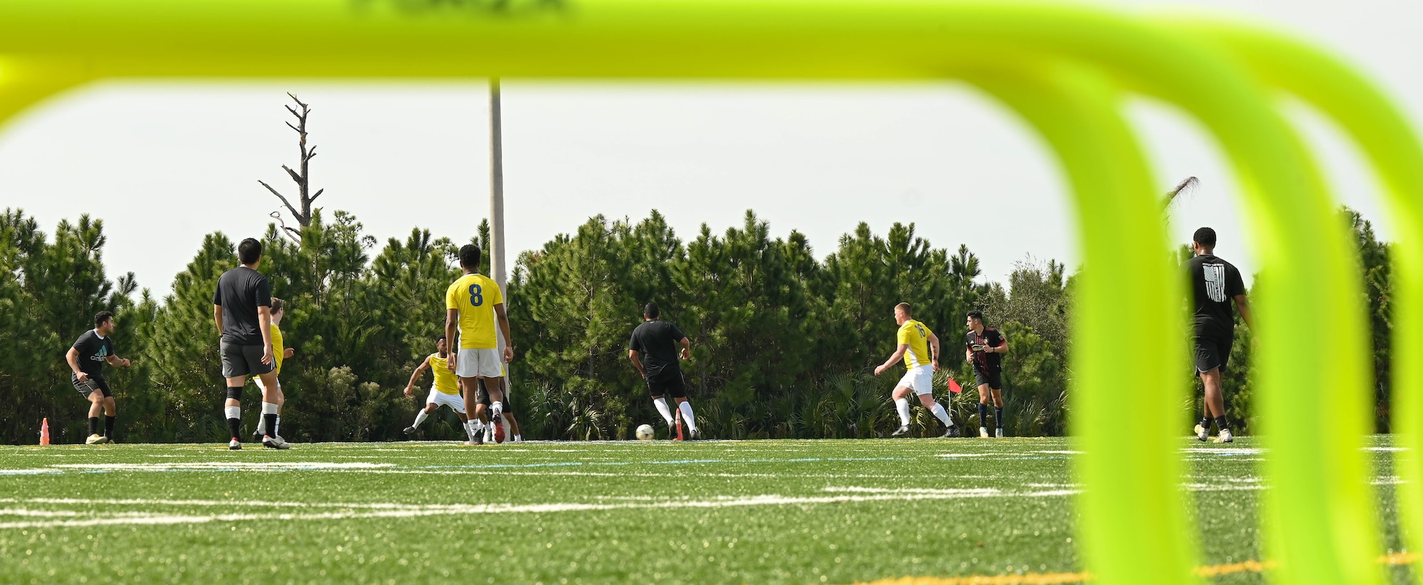 Military members play soccer