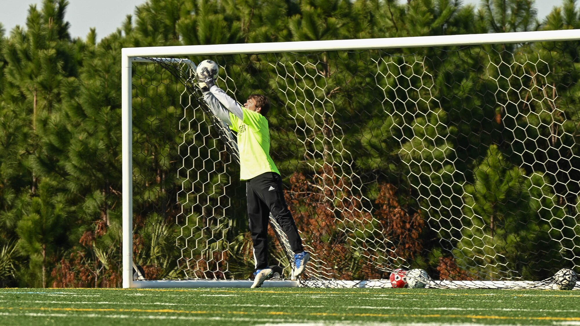 Soccer goalie prevents goal