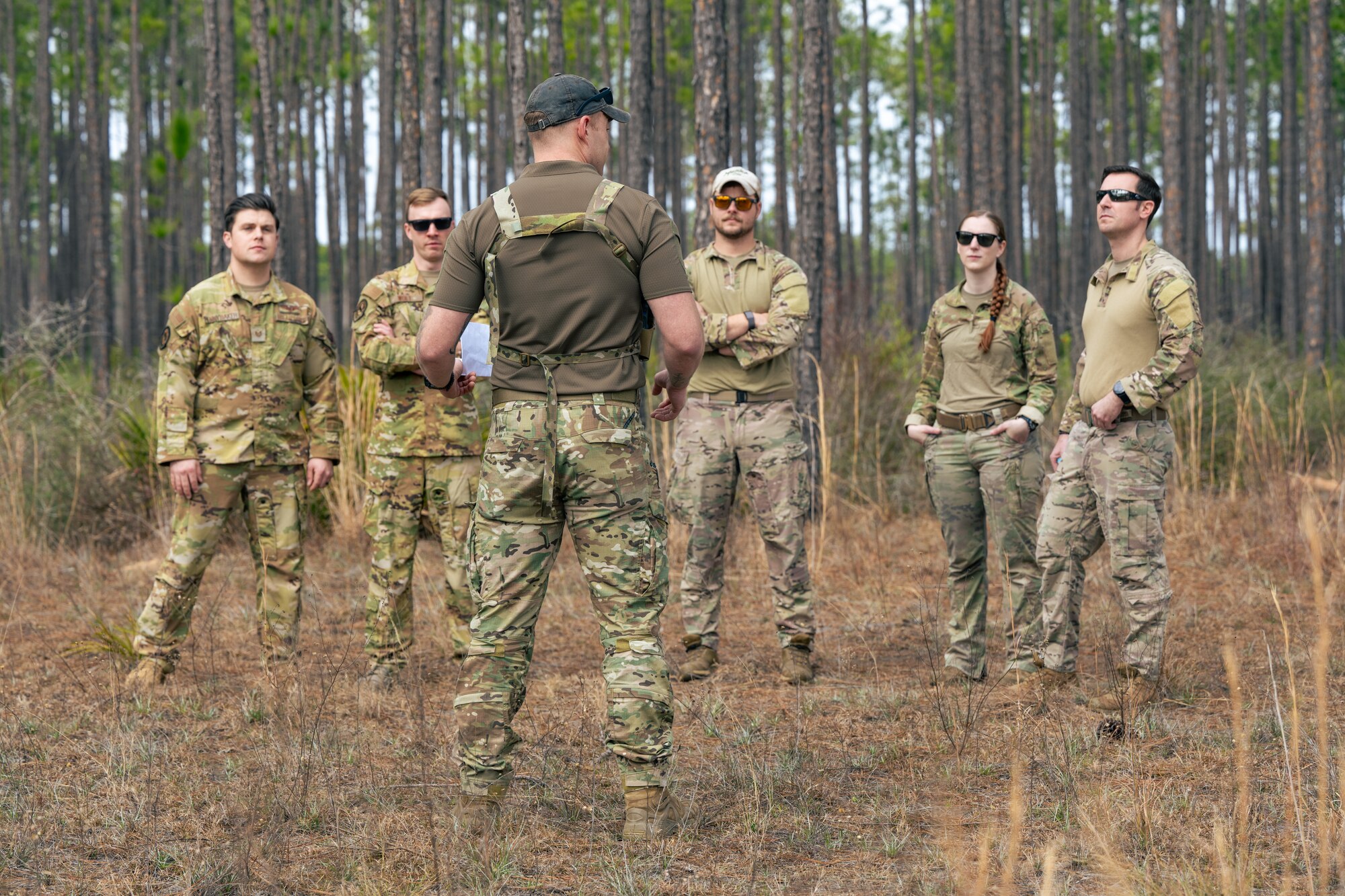 U.S. Air Force Air Commandos are being briefed prior to a survival, escape, resistance, and evasion training at the Eglin Range, Florida, Feb. 8, 2024.