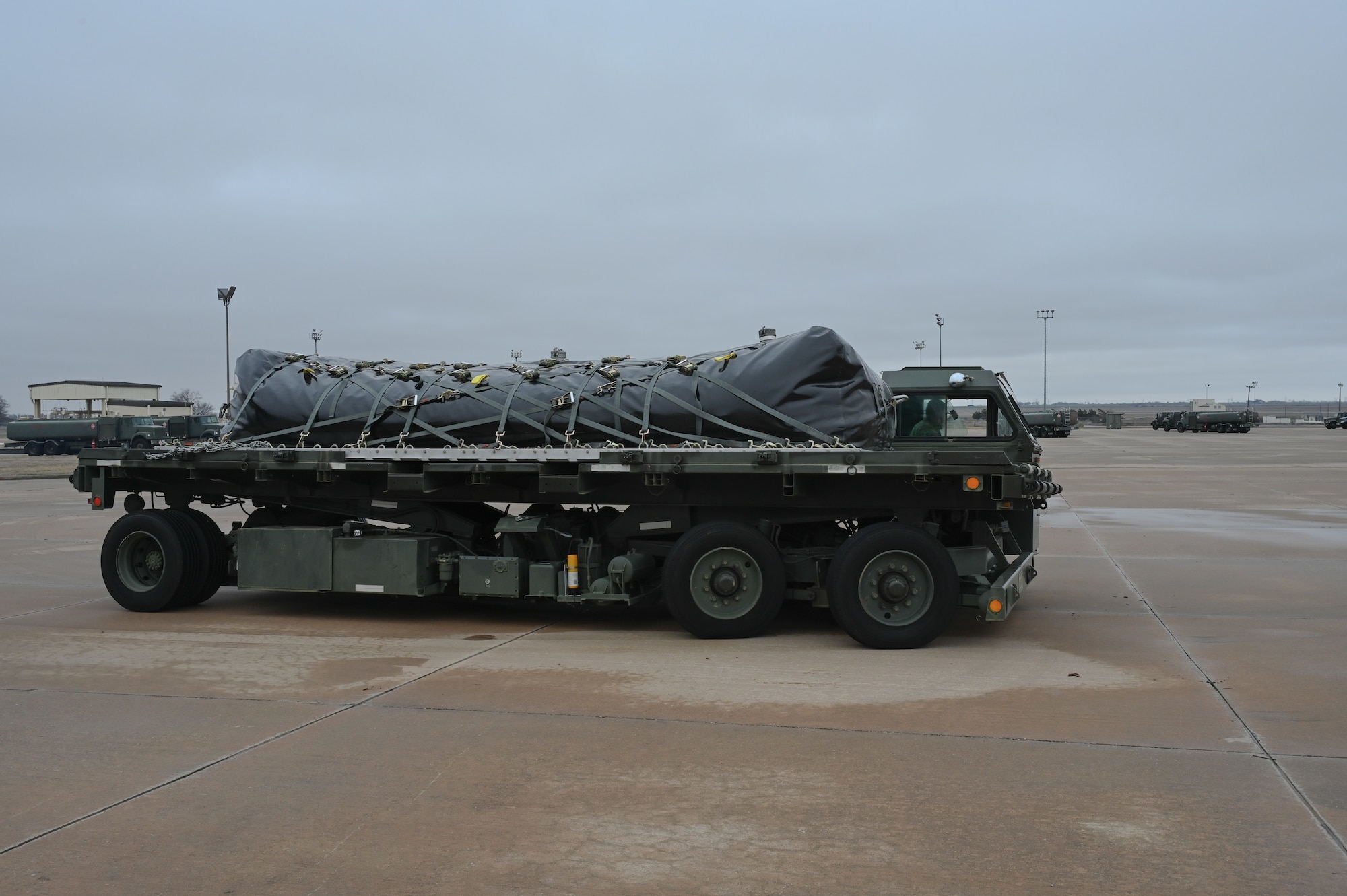 A fuel bladder is on  cargo loader