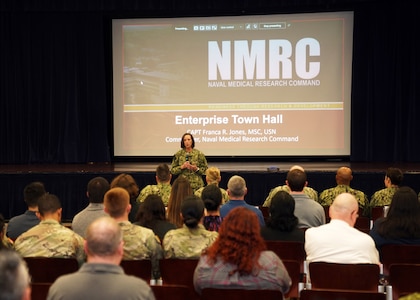 JOINT BASE SAN ANTONIO-FORT SAM HOUSTON – (Feb. 8, 2024) – Capt. Franca Jones, commander, Naval Medical Research Command (NMRC), held a NMRC Enterprise All Hands at the Military and Family Readiness Center during her visit to Naval Medical Research Unit (NAMRU) San Antonio. Jones spoke on numerous topics including the National Defense Authorization Act, the recent Deputy Secretary of Defense Memorandum, and the research and development relationship with the Defense Health Agency. NAMRU San Antonio’s mission is to conduct gap driven combat casualty care, craniofacial, and directed energy research to improve survival, operational readiness, and safety of Department of Defense personnel engaged in routine and expeditionary operations. The Naval Medical Research and Development (NMR&D) enterprise is comprised of eight commands with more than 1,330 Navy Medicine personnel. (U.S. Navy Photo by Burrell Parmer, Naval Medical Forces Support Command Public Affairs/Released)