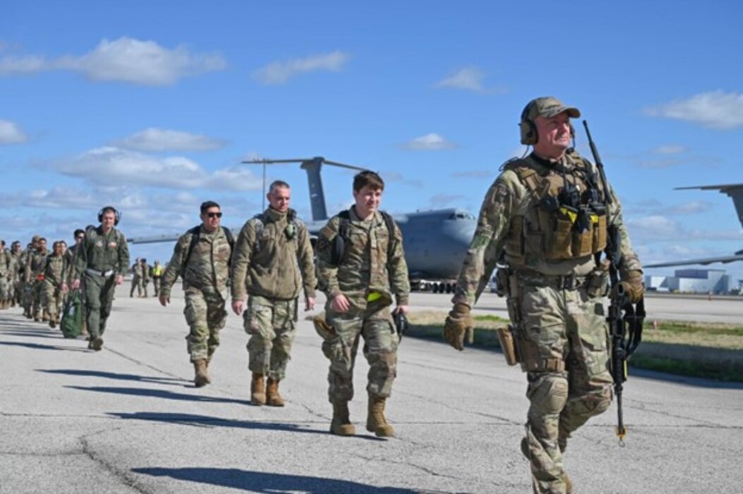 Reserve Citizen Airmen from the 433rd Airlift Wing arrive at a simulated forward deployment location during Exercise Dragon’s Den at Joint Base San Antonio-Lackland, Texas on Feb. 5, 2024.