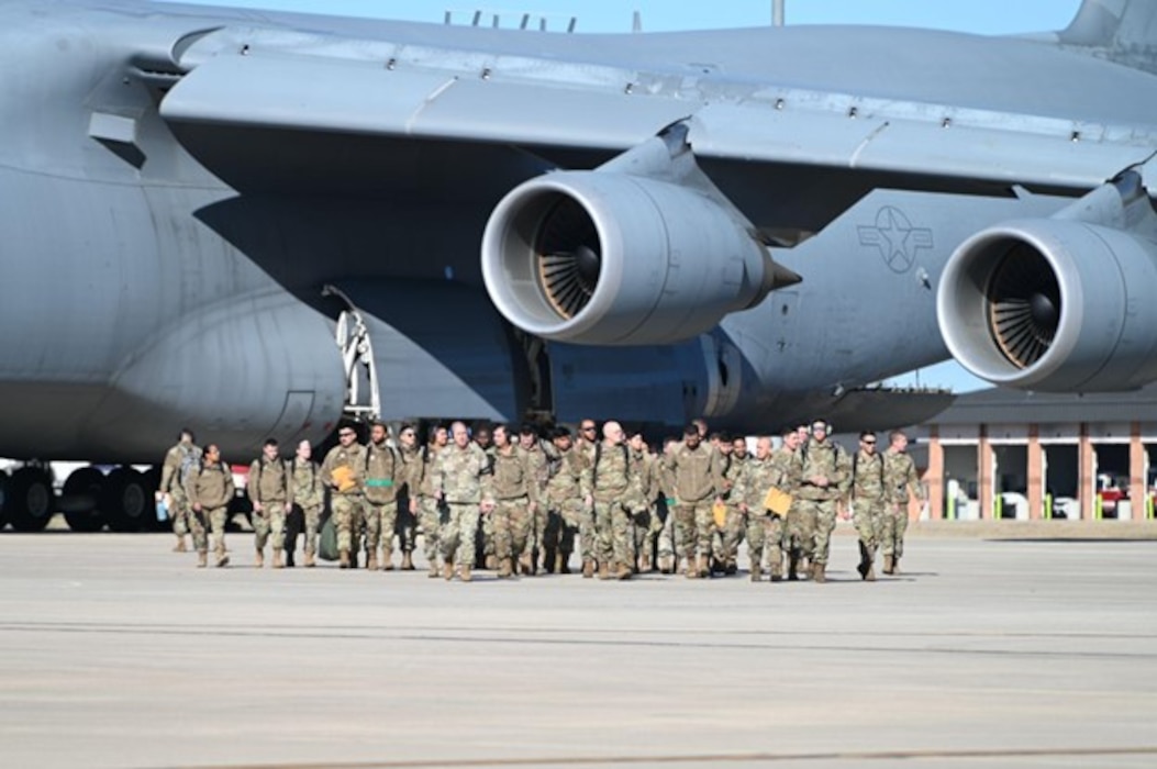 A group of Alamo Wing Reserve Citizen Airmen simulate arriving at a deployed location as part of Exercise Dragon’s Den at Joint Base San Antonio-Lackland, Texas on Feb. 6, 2024.