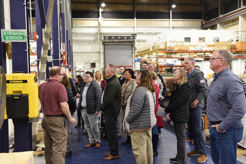 Members of Lesbian, Gay, Bisexual, Transgender, Queer/Questioning, + Allies, (LGBTQ+A) Diversity Action Teams (DAT) from across NAVAIR tour NAWCAD Lakehurst's prototype and manufacturing facility during a Feb. 7 visit. (U.S. Navy photo)
