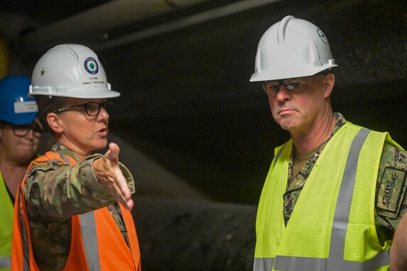 Brig. Gen. Michelle Link, Deputy Commander, Joint Task Force-Red Hill (JTF-RH), discusses defueling operations with Vice Adm. Scott Gray, Commander, Navy Installations Command, during a visit to the Red Hill Bulk Fuel Storage Facility (RHBFSF), Halawa, Hawaii, Feb. 6, 2024.