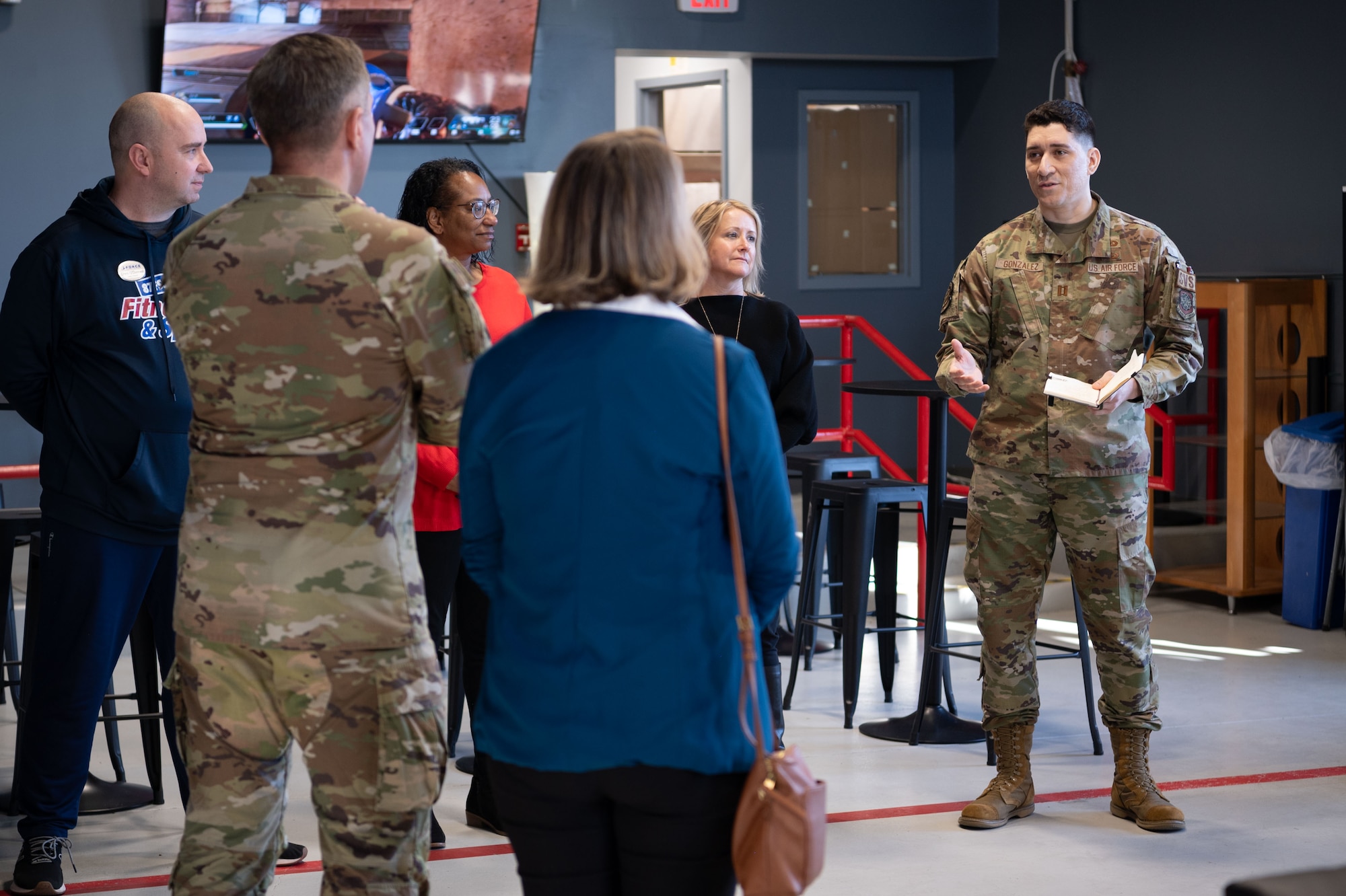 U.S. Air Force Maj. Gen. John Klein, U.S. Air Force Expeditionary Center commander, speaks with 87th Force Support Squadron members during a tour of Joint Base McGuire-Dix-Lakehurst, N.J., Feb. 8, 2024. The tour included stops at unaccompanied housing dorms, the First Term Enlisted Center and the Airman Leadership School. (U.S. Air Force photo by Staff Sgt. Monica Roybal)