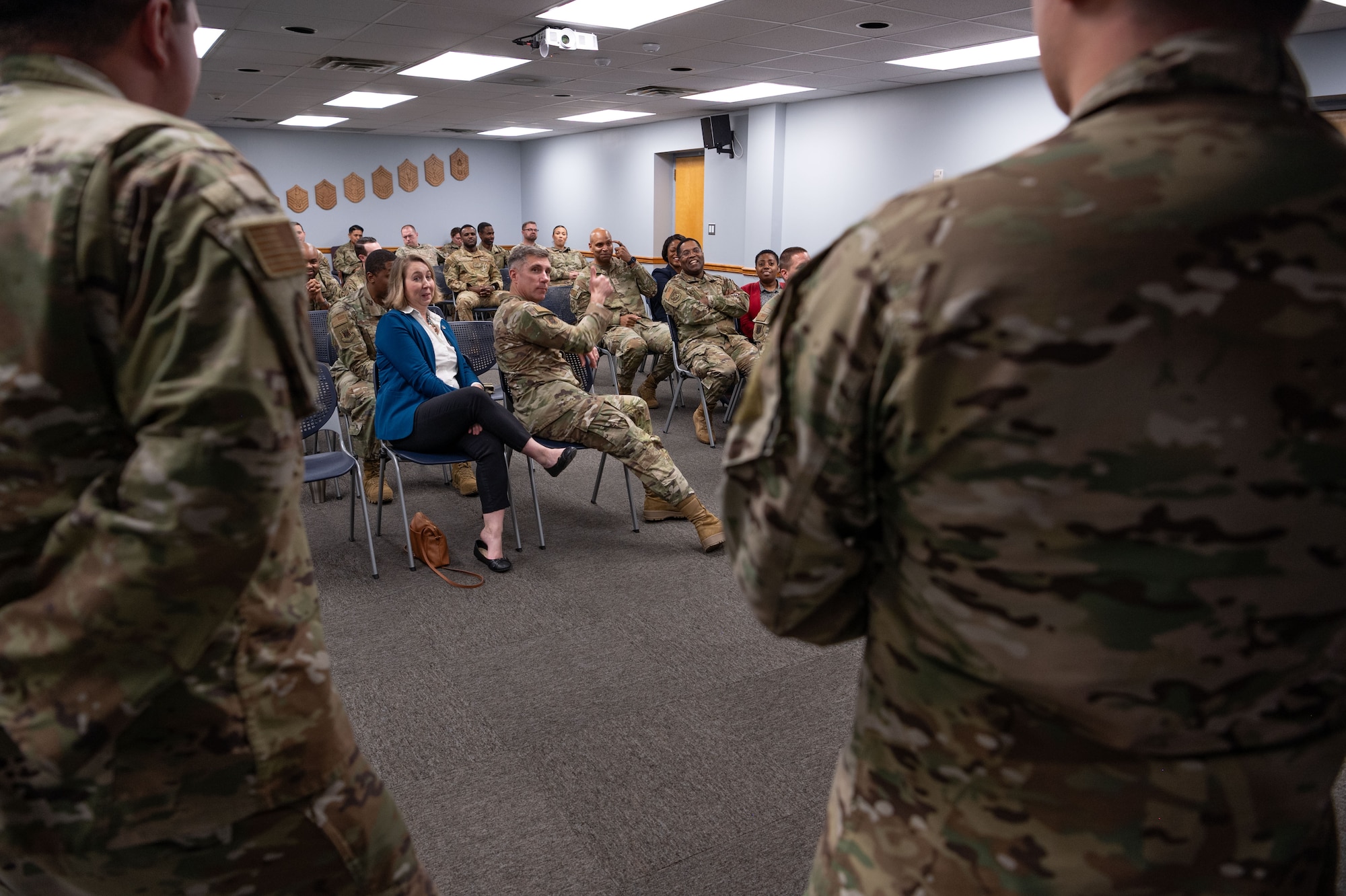 U.S. Air Force Maj. Gen. John Klein, U.S. Air Force Expeditionary Center commander, speaks with Airman Leadership School students during a tour of Joint Base McGuire-Dix-Lakehurst, N.J., Feb. 8, 2024. The tour included stops at unaccompanied housing dorms, the First Term Enlisted Center and the Military Family Readiness Center. (U.S. Air Force photo by Staff Sgt. Monica Roybal)