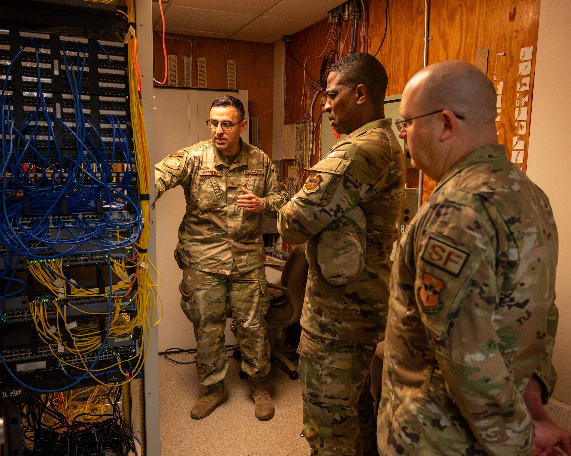 U.S. Air Force Master Sgt. David Herrera, 47th Communications Squadron network control center section chief, shows Col. Robert Moore, 47th Mission Support Group (MSG) commander, and Chief Master Sgt. Anthony Burleson, 47th MSG command chief, improvements being made to the servers at Laughlin Air Force Base, Texas, Feb. 6, 2024. Server improvements allow for faster data flows and more secure information transfer. (U.S. Air Force photo by Staff Sgt. Nicholas Larsen)