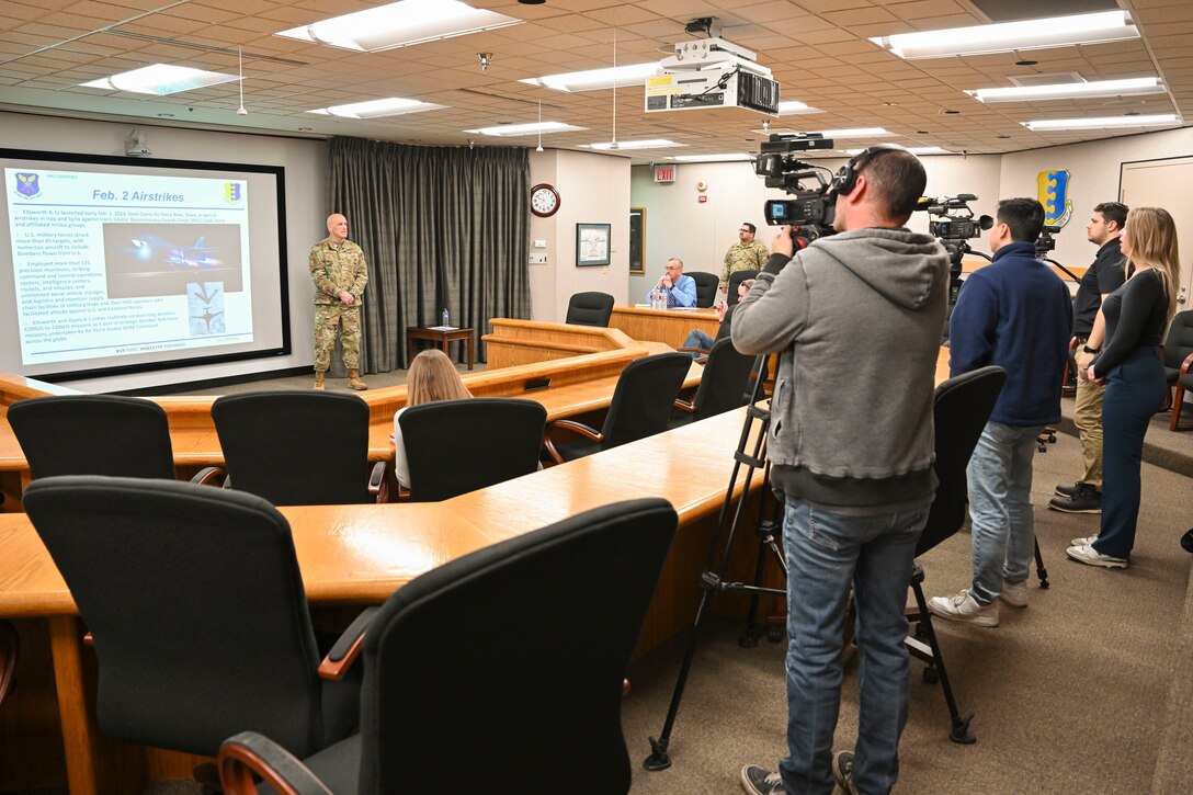 U.S. Air Force Col. Derek Oakley, 28th Bomb Wing commander, speaks to members of the media at Ellsworth Air Force Base, South Dakota, Feb. 12, 2024. During the brief, Oakley spoke about the B-1B Lancer crash, recent airstrikes in Iraq and Syria, and overall base history. (U.S. Air Force photo by Airman 1st Class Brittany Kenney)