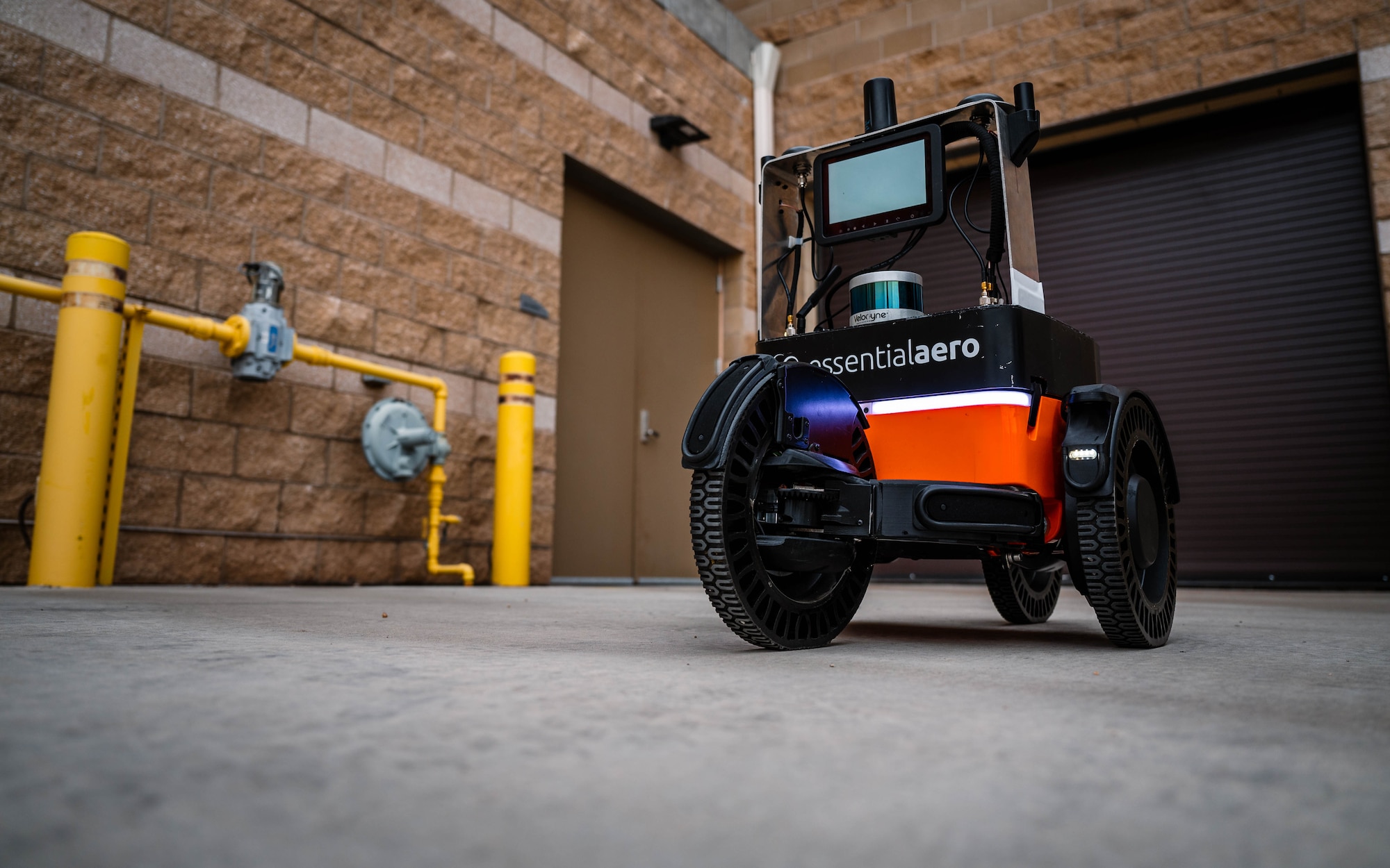 The Luke Air Force Base Spark Cell team’s new autonomous foreign object debris robot sits on display