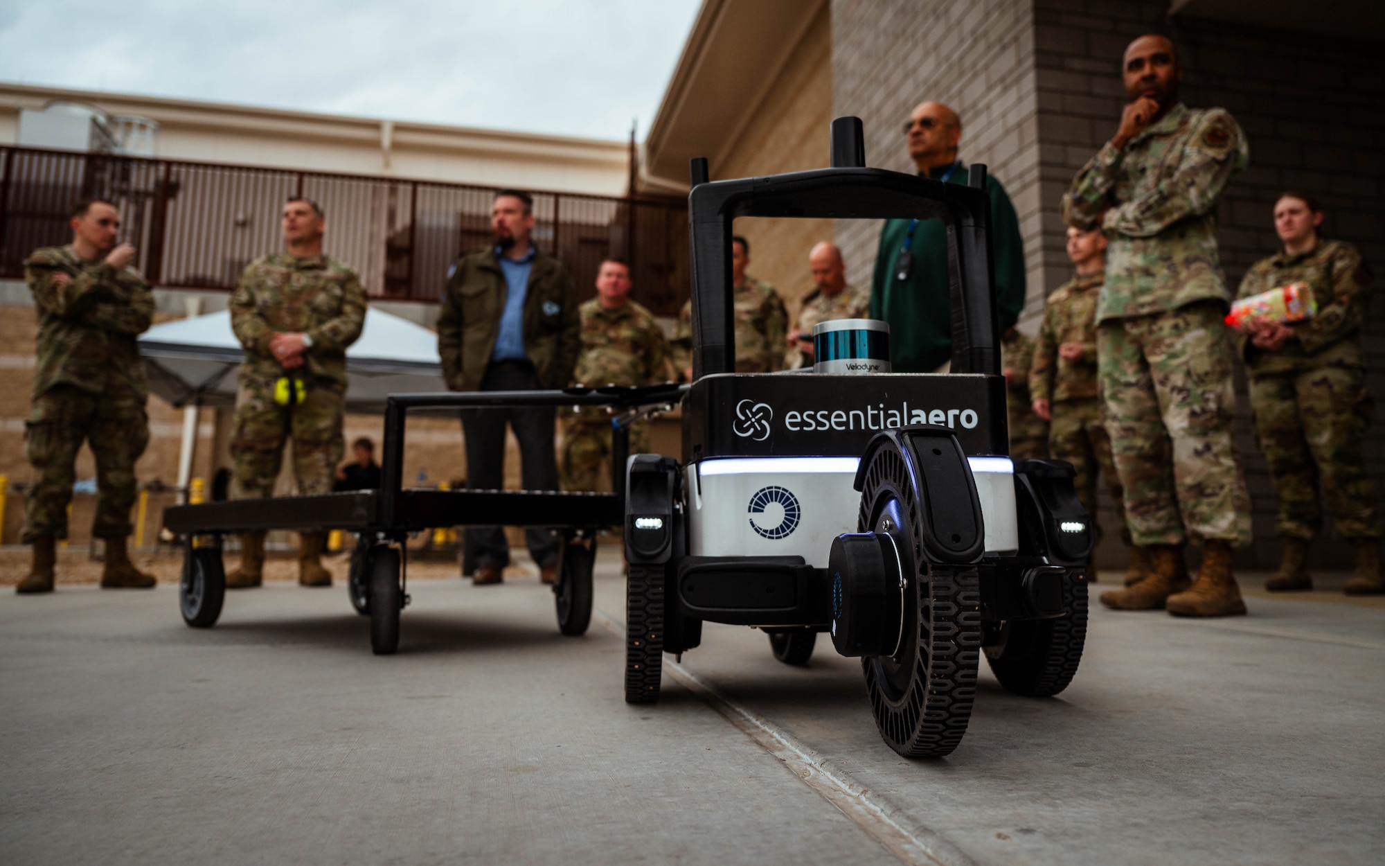 Luke Air Force Base personnel receive a demonstration of Spark Cell’s new autonomous tool delivery robot