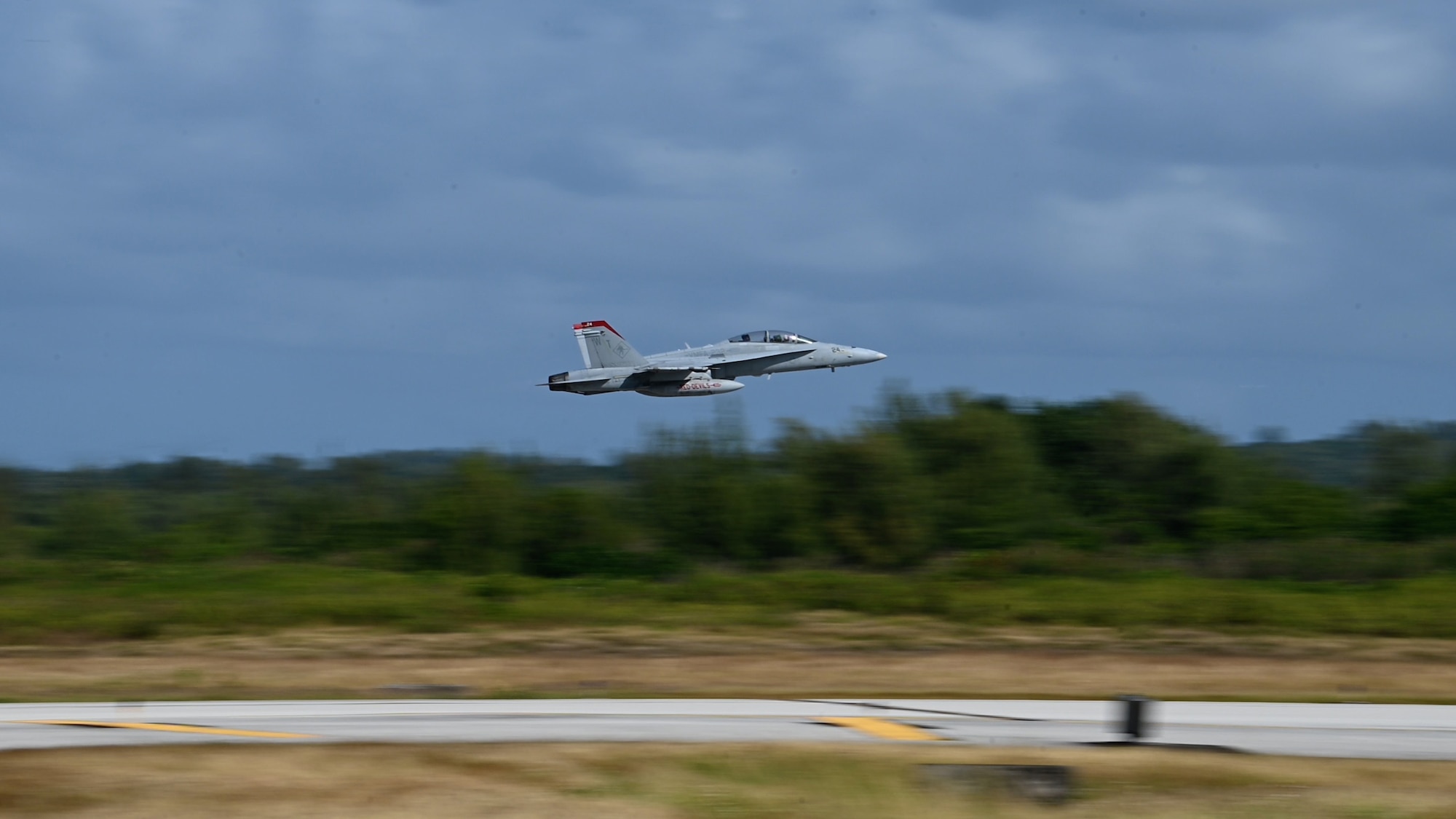 A photo of a U.S. Marine F/A18 Hornet flying