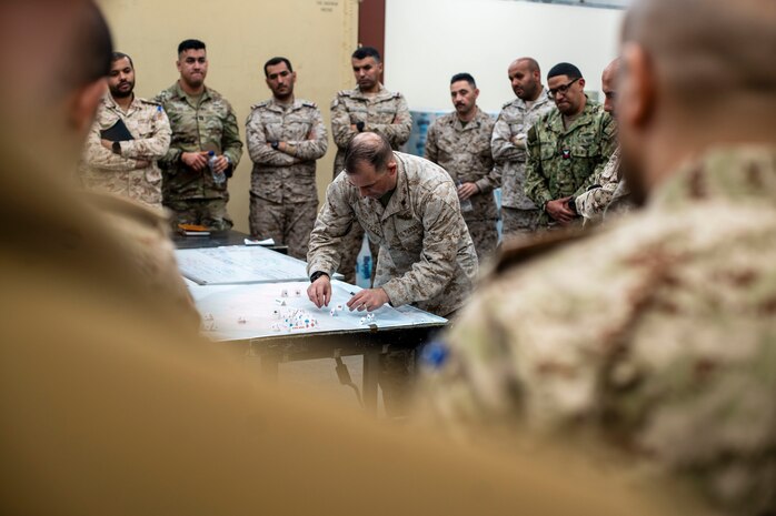 MUHAMMAD AL AHMED NAVAL BASE, Kuwait (Jan. 31, 2024) Marines, Sailors, Soldiers and Kuwaiti armed forces members with the Combined Joint Task Force conduct various scenario wargames during exercise Eager Defender 24 onboard Muhammad Al Ahmed Naval Base, Kuwait, Jan. 31. Eager Defender 24 is the capstone in a series of bilateral exercises between Kuwait and U.S. naval forces, focused on enhancing mutual capabilities and interoperability in maritime security operations. (U.S. Marine Corps photo)